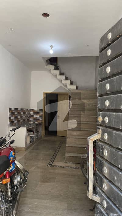 Beautiful 2.5 Marla 3 Storey House with Car Garage | Gas, Electricity & Water Available
