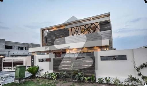 1 KANAL ELEGANT AND FULLY MAINTAINED SUPER HOT LOCATED BUNGALOW IS AVAILABLE IN THE BEST BLOCK OF DHA PHASE 4 LAHORE.