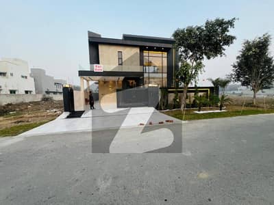 BRAND NEW 1-KANAL ELEGANT AND SUPER HOT LOCATED BUNGALOW IS AVAILABLE IN THE BEST BLOCK OF DHA LAHORE