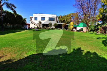 ON MAIN 150 FEET ROAD 4-KANAL (2-KANAL BUNGALOW+2-KANAL LAWN) ELEGANT AND FULLY MAINTAINED SUPER HOT LOCATED BUNGALOW IS AVAILABLE IN THE BEST BLOCK OF DHA PHASE 6 LAHORE