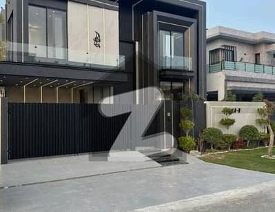 BRAND NEW 1-KANAL ELEGANT AND SUPER HOT LOCATED BUNGALOW IS AVAILABLE IN THE BEST BLOCK OF DHA LAHORE
