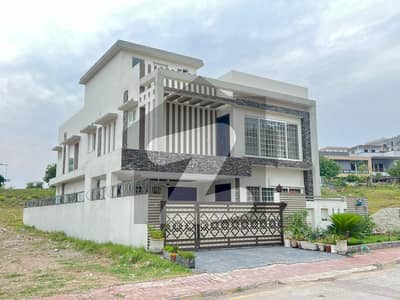 Sector B Owner Built 10 Marla Slightly Used House For Sale with gas solar and 6 mrla lawn space. In Bahria Town Phase 8