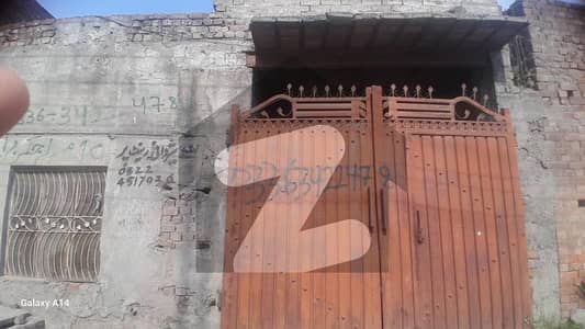 10 marla corner plot with 2 side streets and 50 feet main road access. Located near Ring Road in a prime and fast-growing location.