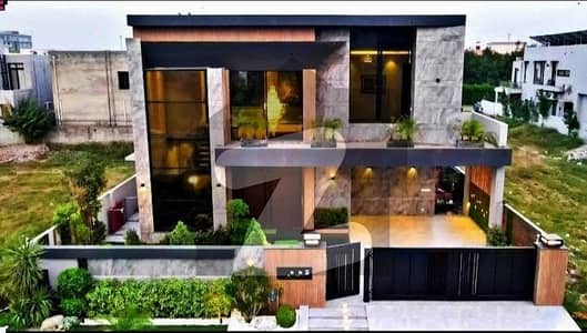 1 KANAL ELEGANT AND FULLY MAINTAINED SUPER HOT LOCATED BUNGALOW IS AVAILABLE IN THE BEST BLOCK OF DHA PHASE 6 LAHORE.