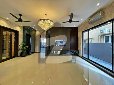 SYED BROTHERS PROUDLY OFFERS: 1-Kanal Elegant And Fully Maintained Bungalow Is Available In The Best Block Of DHA Lahore.