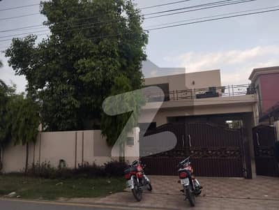SYED BROTHERS PROUDLY OFFERS: 2-Kanal (1 Kanal Bungalow+1 Kanal Lawn) Elegant And Fully Maintained Old Bungalow Is Available In The Best Block Of DHA Lahore.