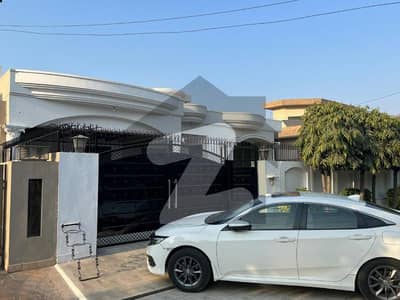 SYED BROTHERS PROUDLY OFFERS: 1-Kanal Elegant And Fully Maintained Single Story Bungalow Is Available In The Best Block Of DHA Lahore.