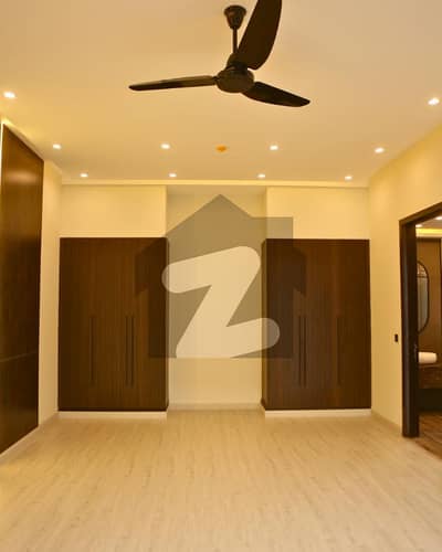 20 MARLA ELEGANT AND FULLY MAINTAINED SUPER HOT LOCATED BUNGALOW IS AVAILABLE IN THE BEST BLOCK OF DHA LAHORE
