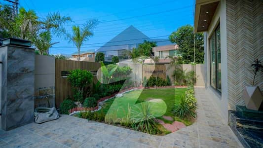 1 KANAL ELEGANT SUPER HOT LOCATED CORNER DOUBLE GATE FURNISHED BUNGALOW IS AVAILABLE IN THE BEST BLOCK OF DHA LAHORE.