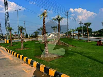 On 40ft Road, 5 Marla Plot In Block-CC, Direct Access to Mega Roads in LDA CITY Lahore.