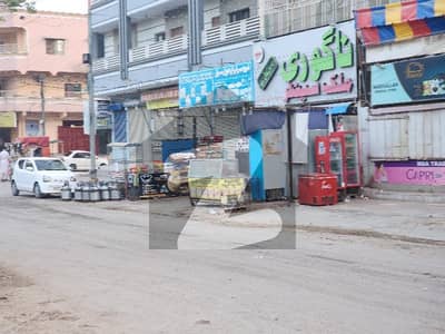 SHOP IN SECTOR Z MAIN 70FT ROAD Main Market NEAR SHAFIQ HOTEL SIZE 14 BY 25 FEET