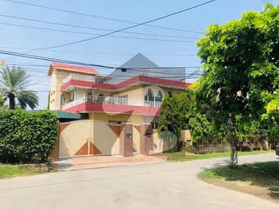 2 KANAL CORNER HOUSE FAR SALE IN GARDEN TOWN GARDEN BLOCK 80 FIT ROAD WIDE