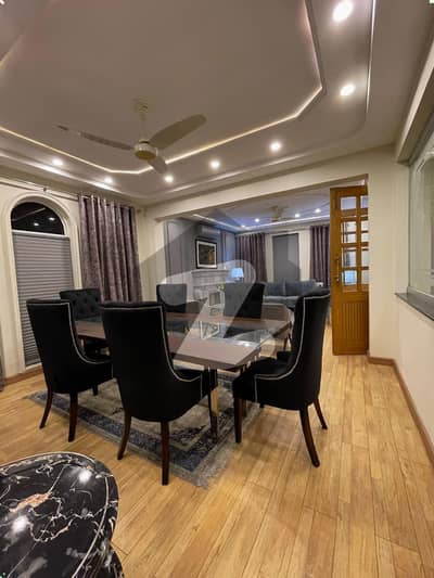 1 KANAL ELEGANT AND FULLY FURNISHED SUPER HOT LOCATED BUNGALOW IS AVAILABLE IN THE BEST BLOCK OF DHA LAHORE | 10 KVA SOLAR.