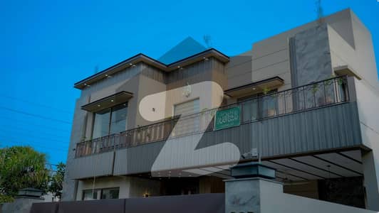 1 KANAL ELEGANT SUPER HOT LOCATED CORNER DOUBLE GATE FURNISHED BUNGALOW IS AVAILABLE IN THE BEST BLOCK OF DHA LAHORE.