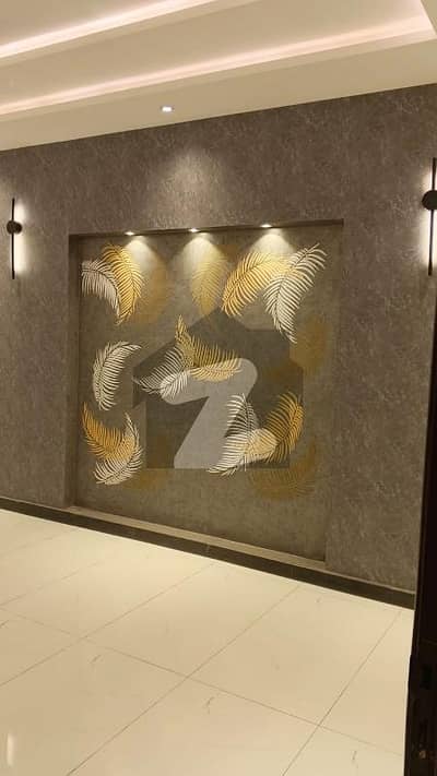 REAL PICS REAL PRICE 10    Near To School Near To Park Near To Market   5 Bed , Attached Bath , Store , Laundry Area , 2 Kitchen , Sperate Entrance , Powder Room , Garage For 3 cars , Terrace Area.     '