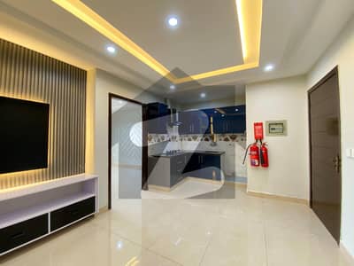 ONE BED SEMI FURNISHED APARTMENT FOR SALE AT INVESTOR RATE IN BAHRIA TOWN LAHORE