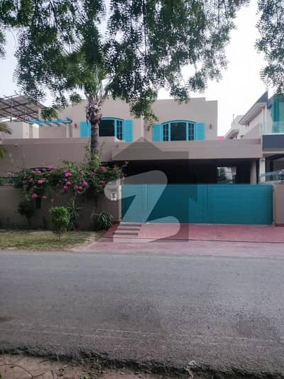 SYED BROTHERS PROUDLY OFFERS: 1-Kanal Elegant And Fully Maintained Old Bungalow Facing Park Is Available In The Best Block Of DHA Lahore.