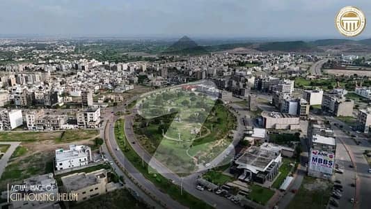 سٹی ہاؤسنگ سکیم جہلم میں 8 مرلہ کمرشل پلاٹ 4.9 کروڑ میں برائے فروخت۔