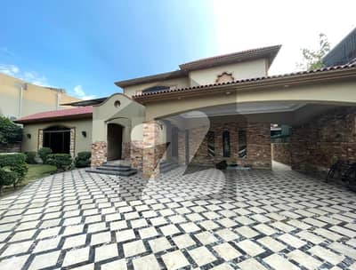 2 Kanal Slightly Used Spanish Design House For Rent In DHA Phase 2 Block-R Lahore.
