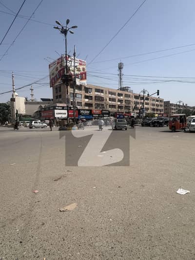 166 SQ YARD GROUND +2 FOR COMMERCIAL ACTIVITY AVAILABLE FOR SALE IN GULSHANE IQBAL BLOCK 7 NEAR DISCO BAKERY