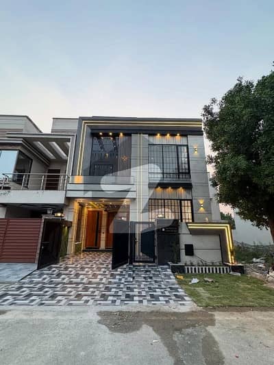 On Wide 50-Feet Road 5-Marla Brand New Luxury Ultra-Modern Design Most Beautiful Bungalow For Sale At Prime Location Of DHA Lahore Near To Park Masjid & Commercial Market.