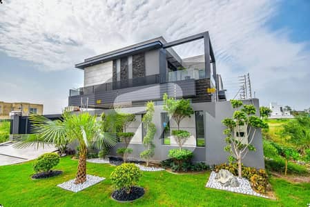 AN ARCHITECTURAL FORTRESS OF LUXURY: THE ULTIMATE 1 KANAL BUNGALOW WITH BASEMENT.