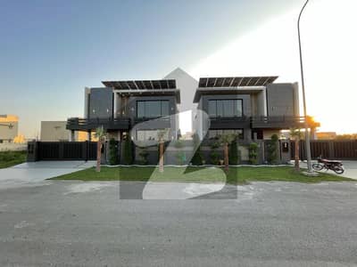 GIFT FOR TWO BROTHER 1-1 KANAL PAIR 2 HOUSES ELEGANT AND BRAND NEW SUPER HOT LOCATED BUNGALOWS IS AVAILABLE IN THE BEST BLOCK OF DHA LAHORE.