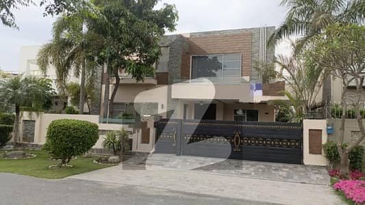 Elegant Facing Park Rental Residence in DHA Phase 5 Luxury 1-Kanal House with Drawing Dining, TV Lounge, Modern Kitchen & Premium Construction Quality