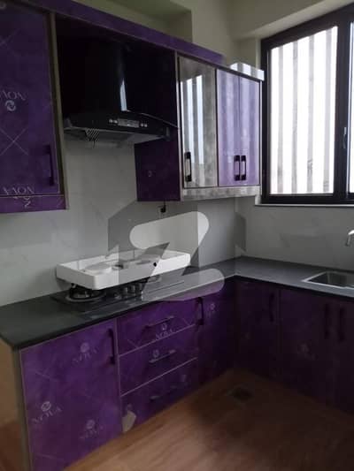 Rent: PKR 60,000/month  Contact: 03004763934   Apartment Features & Amenities:  Brand New Apartment  1 Spacious Bedroom  Attached Modern Bathroom  Stylish Kitchen  TV Lounge / Living Area  Balcony with Open View  Tile Flooring  Wooden Work & Modern Finishing  Reserved Parking  24/7 Security  Family-Friendly Environment  Near Main Raiwind Road  Easy Access to Markets, Restaurants