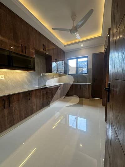 Brand new 10 marla ground portion available for rent 2 bed accommodation 1 American kitchen available for rent in Bahria Enclave Sector C1