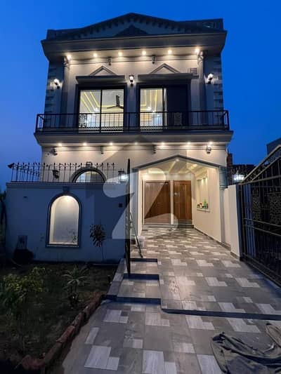 5 Marla Luxury House for Sale   4 Bed Brand New Prime Location  2 Min Drive from Ring Road  15 KM from Airport  Modern Design Al Kabir Town Phase 2