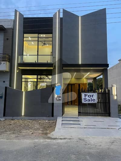 5 Marla Ultra Modern House For Sale Hot Location Of Dha Phase 11 Rahbar Sector 2 F block Next to 50 Feet Road.