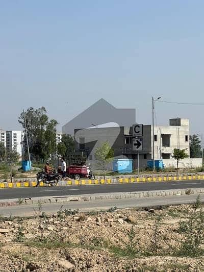 DHA Phase 7 T Block - 10 Marla Corner Plot on 70ft Road for Sale in a prime and highly desirable location.