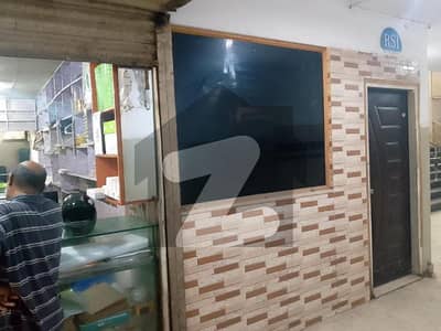 Shop For Sale On Main Shahrah-E-Faisal Building