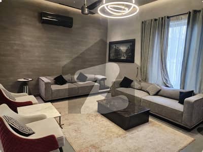 1 KANAL ELEGANT AND FULLY FURNISHED SUPER HOT LOCATED BUNGALOW WITH BASEMENT IS AVAILABLE IN THE BEST BLOCK OF DHA LAHORE.