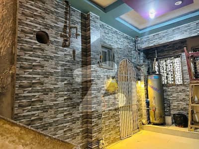 Spacious 2-in-1 Renovated Apartment for Sale in Karimabad Block 1 | Main Road Facing | Prime Location