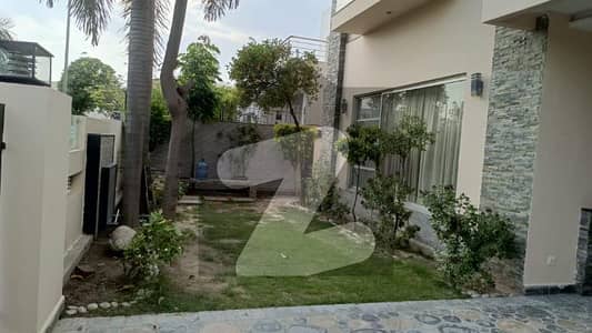 DHA Phase 5 1 Kanal Brand New House for Rent Beautifully designed modern house featuring elegant architecture, spacious bedrooms, stylish TV lounges, and premium finishing.