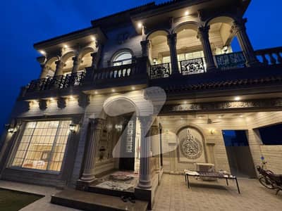 Spanish-Inspired 2-Kanal Luxury Mansion For Sale In DHA Phase 6 Featuring One Kanal Elegant Living Space & One Kanal Lush Green Lawn, Easy Deal Opportunity By Wall Green Realtors