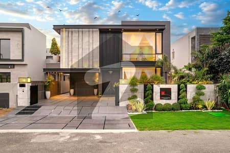 1 Kanal House Eye Catching Bungalow Full Basement Available For Sale In DHA Phase 6 Prime Location Near To Park & Raya Main Approach