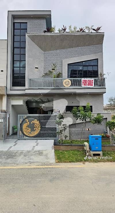 5 Marla Double Unit designer House Available. For Sale in Faisal Town F-18 Islamabad.