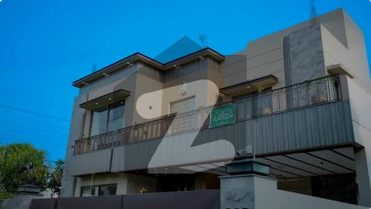 1 KANAL ELEGANT SUPER HOT LOCATED CORNER DOUBLE GATE FURNISHED BUNGALOW IS AVAILABLE IN THE BEST BLOCK OF DHA LAHORE.