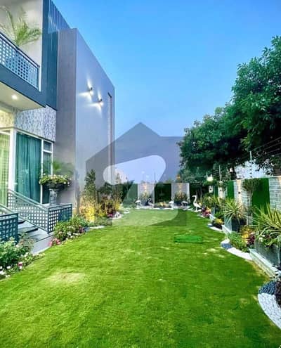SYED BROTHERS PROUDLY OFFERS: 2-Kanal Elegant And Fully Furnished Modern Bungalow with Basement, Swimming Pool Is Available In The Best Block Of DHA Lahore.