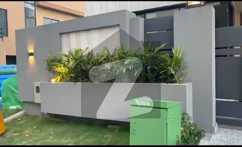 10 Marla Brand New Designer 4 Bedrooms Single Unit located at Zaraj Housing Society Opposite Giga Mall & DHA 2. Dem 6.00 slightly negotiable