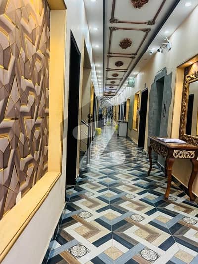 10 Marla Hostal For Sale 4 Story near UMT University Johar Town Phase 1 prime location