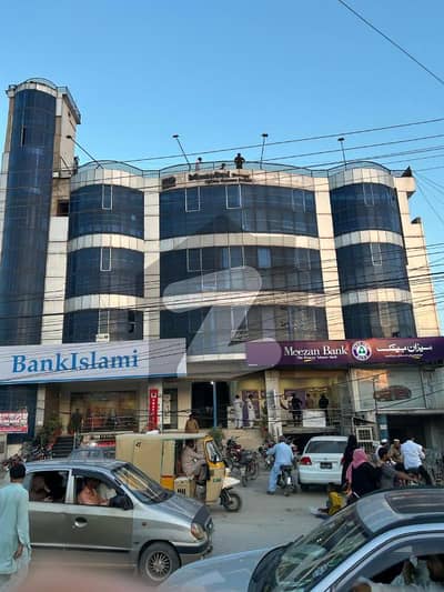 SHOP FOR RENT ADYALA TOWER, Rawalpindi. Ideal For Pharmacy, Clinic, Or Retail. Spacious Shop With Glass Door, Bright Lighting, On Main Road With Parking. CCTV-Enabled, Rs. 20