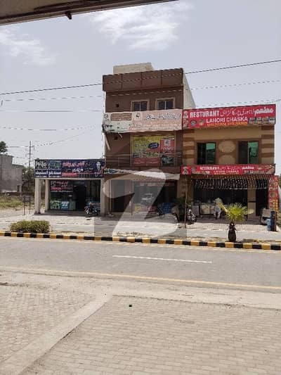 3 Marla Triple Story Commercial Plaza For Sale in Al Haram Garden Lahore