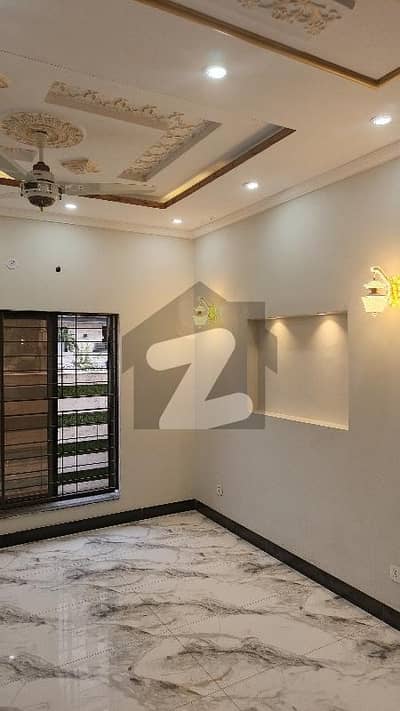 5 Marla Brand New Full House with 5 bedrooms attach bathrooms, Triple Kitchen, Triple Tv Lounge, Woodwork,tile flooring everything done Available For Rent in the most Precious Society of Raiwind Road Lahore Etihad Town Phase 1.