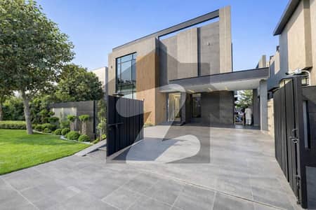 Stunning One Kanal Modern Style Designer Bungalow With Contemporary Elevation, Premium Finishing And Elegant Architecture, Ideally Located At Walking Distance From Fairways Commercial. Stunning One Kanal Modern Style Designer Bungalow With Contemporary Elevation, Premium Finishing And Elegant Architecture, Ideally Located At Walking Distance From Fairways Commercial.