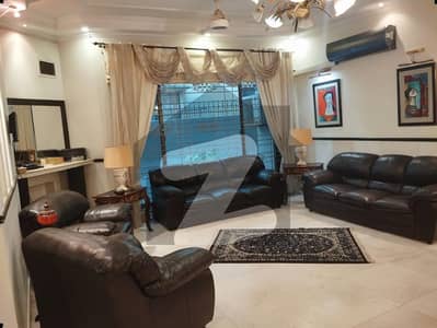 1 KANAL ELEGANT AND FULLY MAINTAINED SUPER HOT LOCATED BUNGALOW IS AVAILABLE IN THE BEST BLOCK OF DHA LAHORE.