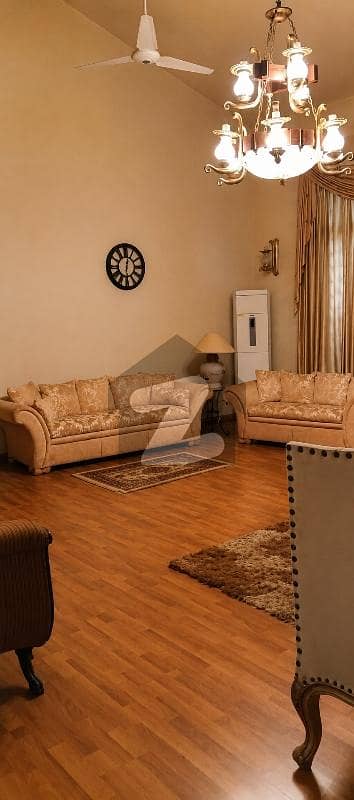 ARCHITECTURAL MASTERPIECE 1000 SQUARE YARD OWNER-BUILT NASEEM NAJMI BUNGALOW FOR SALE ON B STREET, DHA PHASE 5